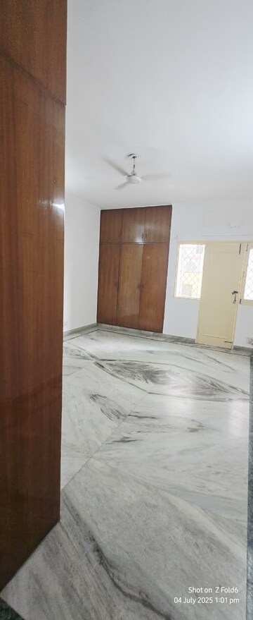 Bedroom in 4 BHK Builder Floor at Sarvodaya Enclave – for Rent