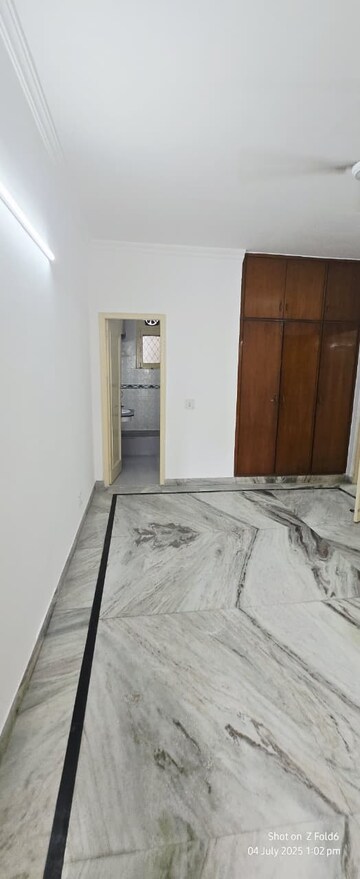Bedroom in 4 BHK Builder Floor at Sarvodaya Enclave – for Rent
