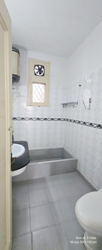Bathroom in 4 BHK Builder Floor at Sarvodaya Enclave – for Rent