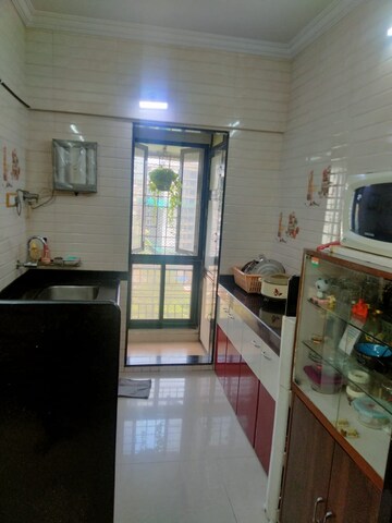 Kitchen in 2 BHK Apartment at Vile Parle East – for Sale