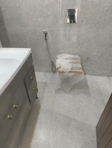 Bathroom in 4 BHK Apartment at Vasant Kunj – for Sale
