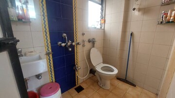 Bathroom in 2 BHK Apartment at Satellite Garden, Goregaon East – for Rent