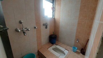 Bathroom in 2 BHK Apartment at Satellite Garden, Goregaon East – for Rent