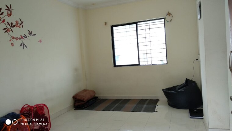 Living Room, laxmi-ganga-residency-apartment 1 Bedroom 600 Sq.Ft. Apartment In Anand Nagar Pune 9167799