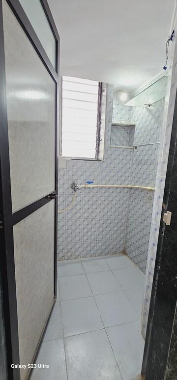 Bathroom in 1 BHK Apartment at Deepanjali CHS, Malad West – for Rent