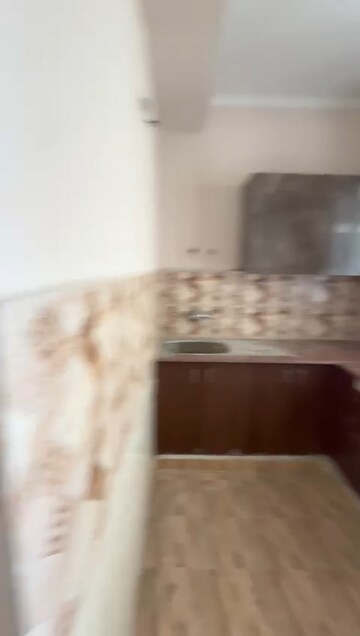 Kitchen in 2 BHK Apartment at Amrapali Golf Homes, Sector 4 Greater Noida – for Rent