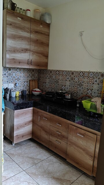 Kitchen in 2.5 BHK Apartment at Mahagun Mahagunpuram II, Lal Kuan – for Sale