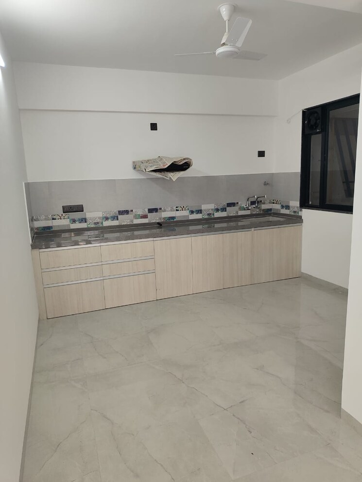 Kitchen, unique-youtopia 2 Bedroom 757 Sq.Ft. Apartment In Kharadi Pune 9167604