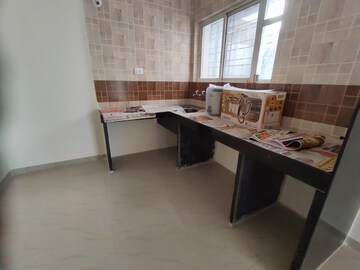 Kitchen in 1 BHK Apartment at Madhav Baug Residency, Anand Nagar – for Sale