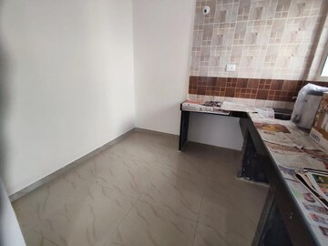 Kitchen in 1 BHK Apartment at Madhav Baug Residency, Anand Nagar – for Sale
