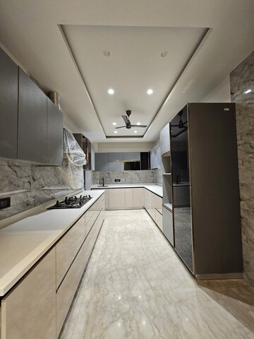 Kitchen in 4 BHK Penthouse at Krisumi Waterfall Suites, Sector 36a – for Sale