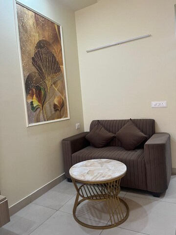 Living Room in Studio Apartment at Gaur City Center, Sector 4 Greater Noida – for Rent