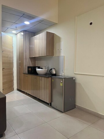 Kitchen in Studio Apartment at Gaur City Center, Sector 4 Greater Noida – for Rent