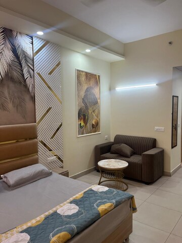 Living Room in Studio Apartment at Gaur City Center, Sector 4 Greater Noida – for Rent