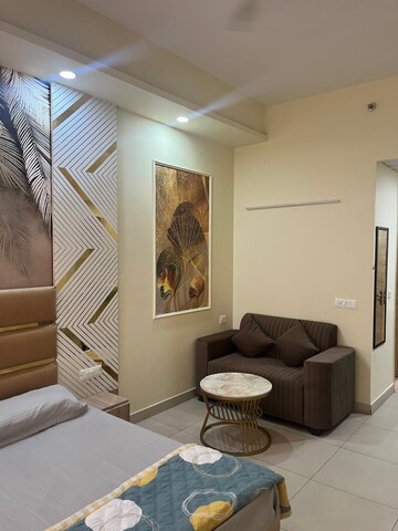 Living Room in Studio Apartment at Gaur City Center, Sector 4 Greater Noida – for Rent