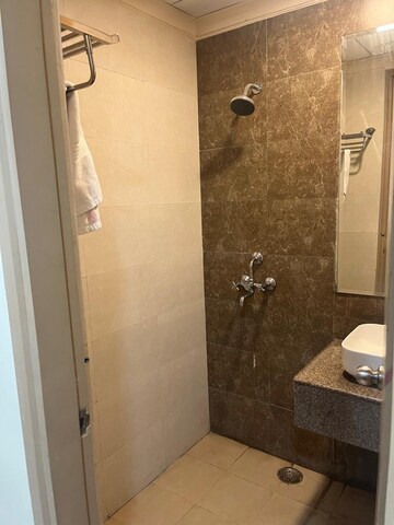 Bathroom in Studio Apartment at Gaur City Center, Sector 4 Greater Noida – for Rent