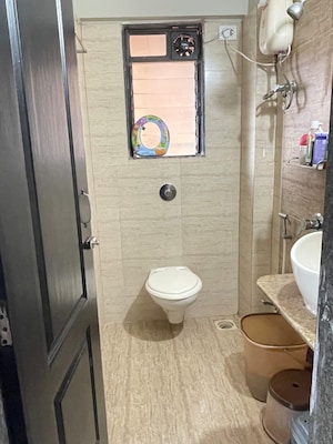 Bathroom in 1 BHK Apartment at Deepak Daffodils, Andheri East – for Sale