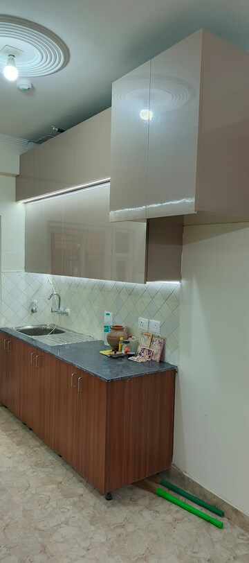 Kitchen in 2 BHK Apartment at Amrapali Enchante, Tech Zone 4 Greater Noida – for Sale