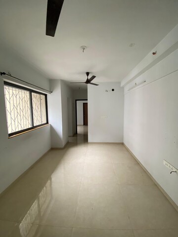 Living Room in 1 BHK Apartment at Lodha Palava Downtown, Dombivli East – for Rent