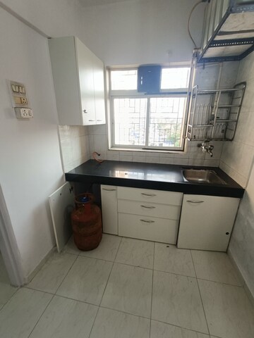 Kitchen in 1 BHK Apartment at Swati Apartment Andheri West, Andheri West – for Rent