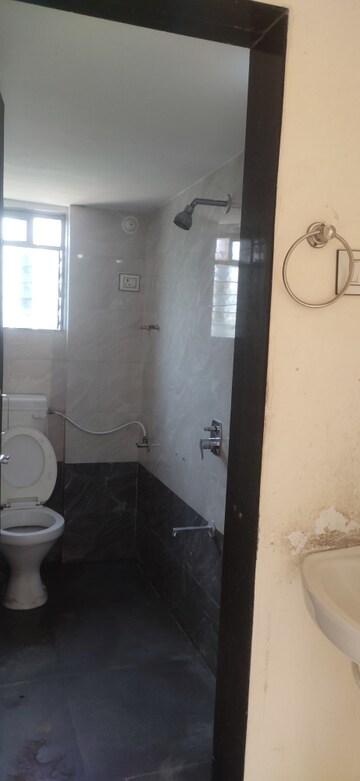 Bathroom in 2 BHK Apartment at Mahad – for Rent