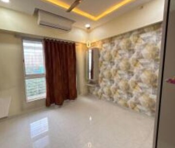Living Room in 2 BHK Apartment at Lodha Amara, Kolshet Road – for Rent