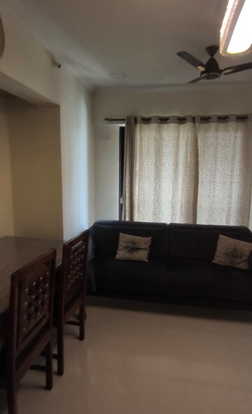 Living Room in 1 BHK Apartment at Raunak Heights, Ghodbunder Road – for Rent