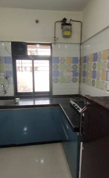 Kitchen in 1 BHK Apartment at Raunak Heights, Ghodbunder Road – for Rent