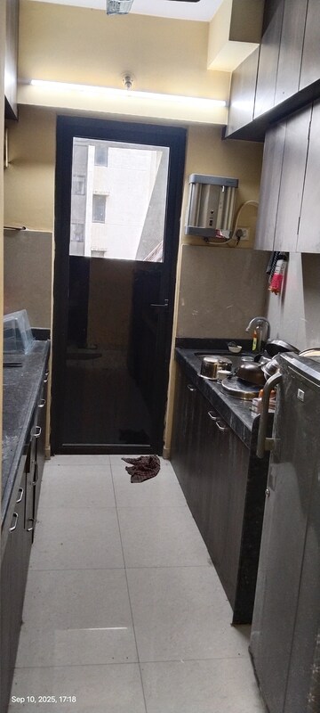 Kitchen in 1.5 BHK Apartment at Lodha Downtown, Dombivli East – for Rent