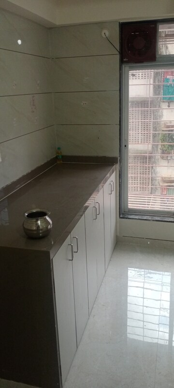 Kitchen in 1 BHK Apartment at Bindra Complex, Andheri East – for Rent