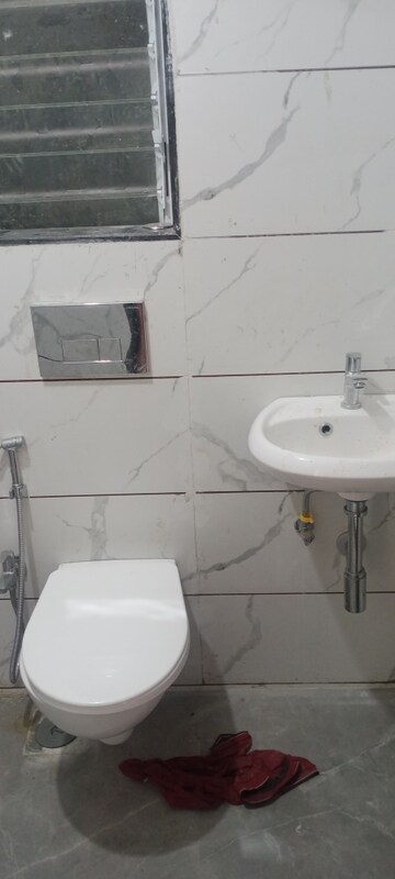 Bathroom in 1 BHK Apartment at Bindra Complex, Andheri East – for Rent