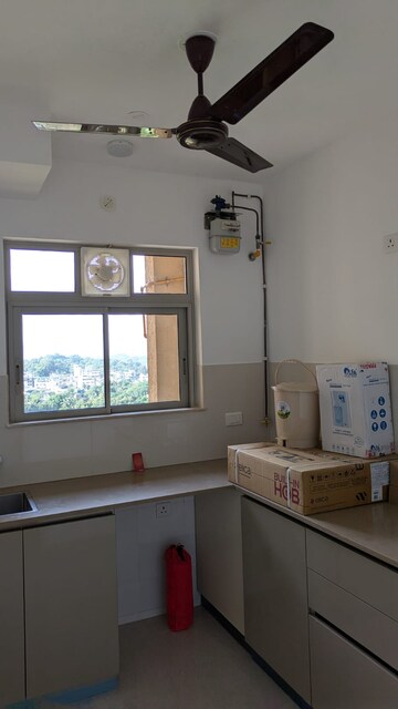 Kitchen in 1 BHK Apartment at Vihang Vermont, Ghodbunder Road – for Rent