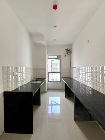 Kitchen in 4 BHK Apartment at Kalpataru Immensa, Kolshet Road – for Sale