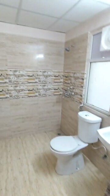 Bathroom in 3 BHK Apartment at Amrapali Golf Homes, Sector 4 Greater Noida – for Rent