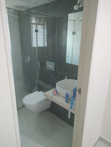 Bathroom in 1.5 BHK Apartment at Dosti West County, Balkum Pada – for Rent