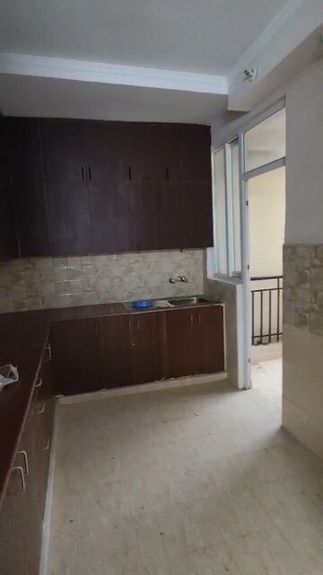 Kitchen in 3 BHK Apartment at Amrapali Golf Homes, Sector 4 Greater Noida – for Rent