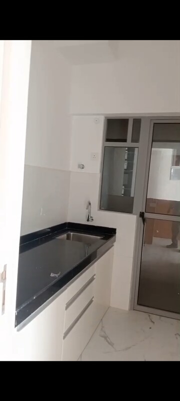 Kitchen in 2 BHK Apartment at Dynamix Avanya, Dahisar East – for Rent