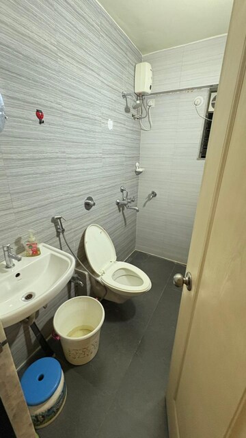Bathroom in 2 BHK Apartment at Cosmos Jewels, Ghodbunder Road – for Rent