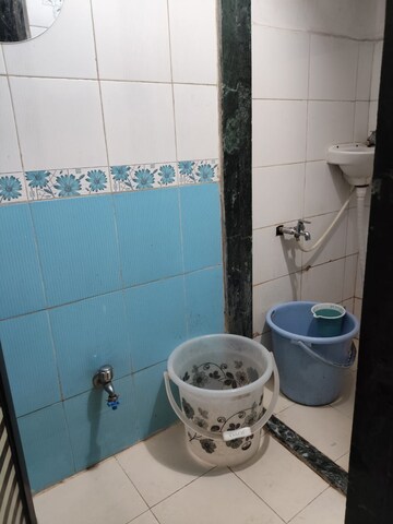 Bathroom in 1 BHK Apartment at Kanha CHS, Kopar Khairane – for Rent