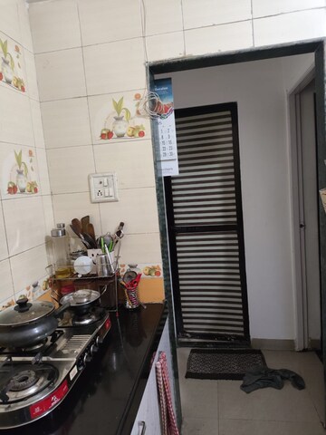 Kitchen in 1 BHK Apartment at Kanha CHS, Kopar Khairane – for Rent