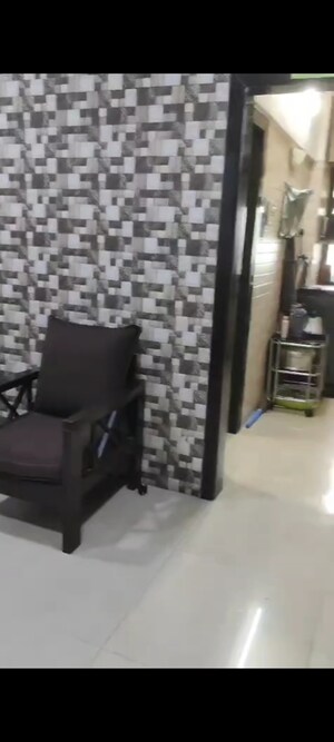 Living Room in 1 BHK Apartment at Kishore Kunj CHS, Mazgaon – for Sale