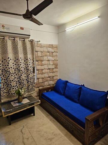 Living Room in 1 BHK Apartment at Juhu – for Rent