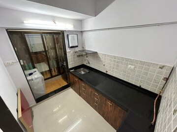 Kitchen in 1.5 BHK Apartment at Mashyakh Tower, Malad West – for Rent