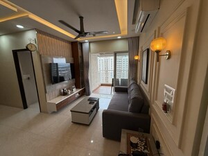 Living Room in 2 BHK Apartment at Lodha Amara, Kolshet Road – for Sale