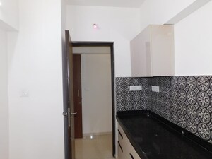 Kitchen in 2 BHK Apartment at Lodha Amara, Kolshet Road – for Sale