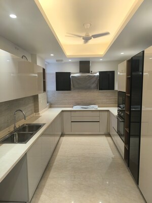 Kitchen in 4 BHK Builder Floor at DLF Royale Residences, Dlf Phase I – for Sale