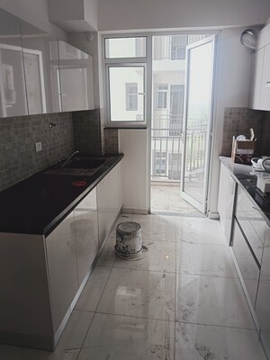 Kitchen in 2 BHK Apartment at Godrej Woods, Sector 43 – for Sale