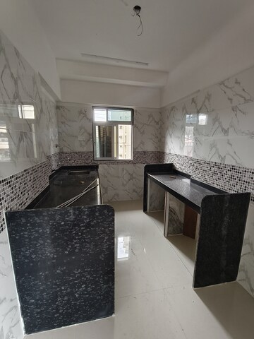Kitchen in 1 BHK Apartment at DGS Sheetal Tapovan, Malad East – for Sale