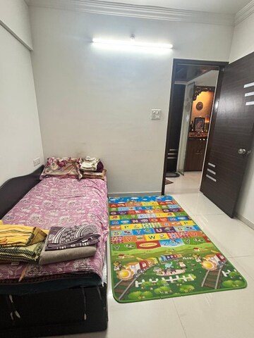 Bedroom in 2 BHK Apartment at GK Aryavat, Ravet – for Rent