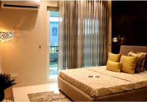 Bedroom in 4 BHK Apartment at Artique Uptown Skylla, International Airport Road – for Sale